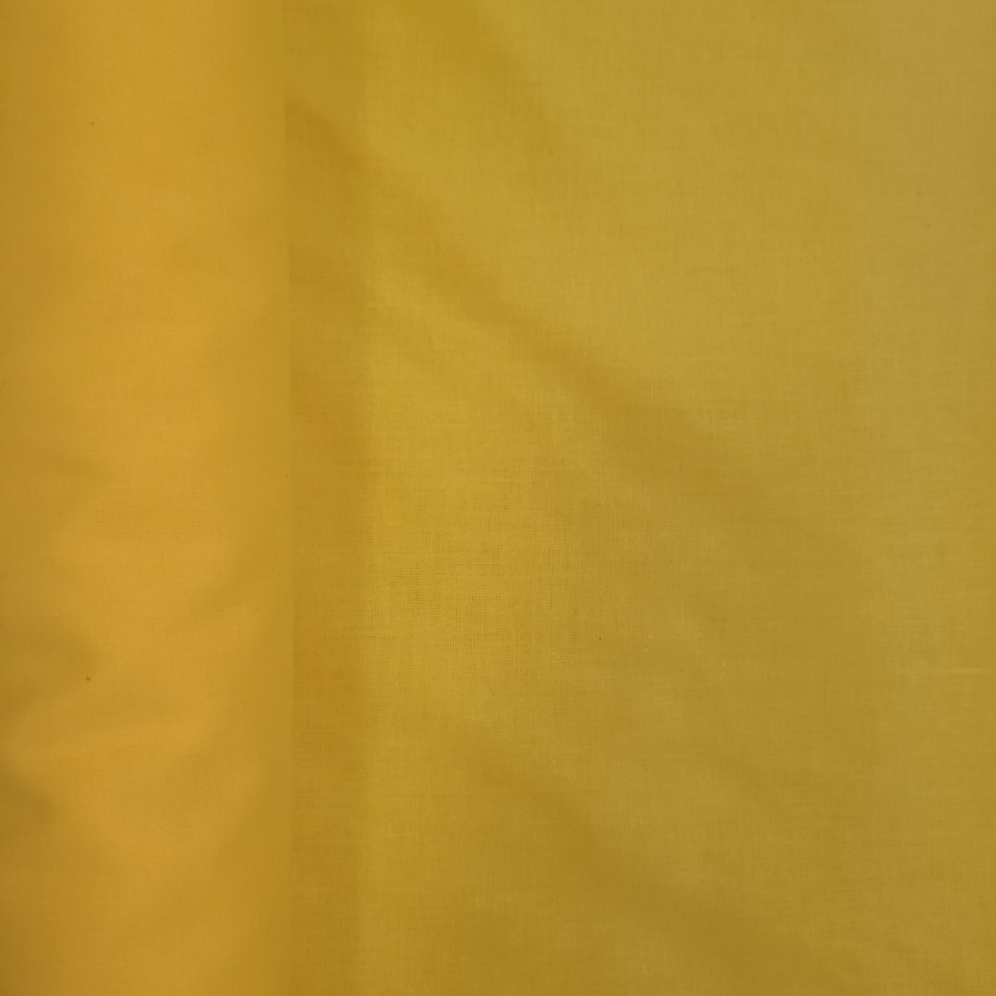 Yellow cotton material by the metre