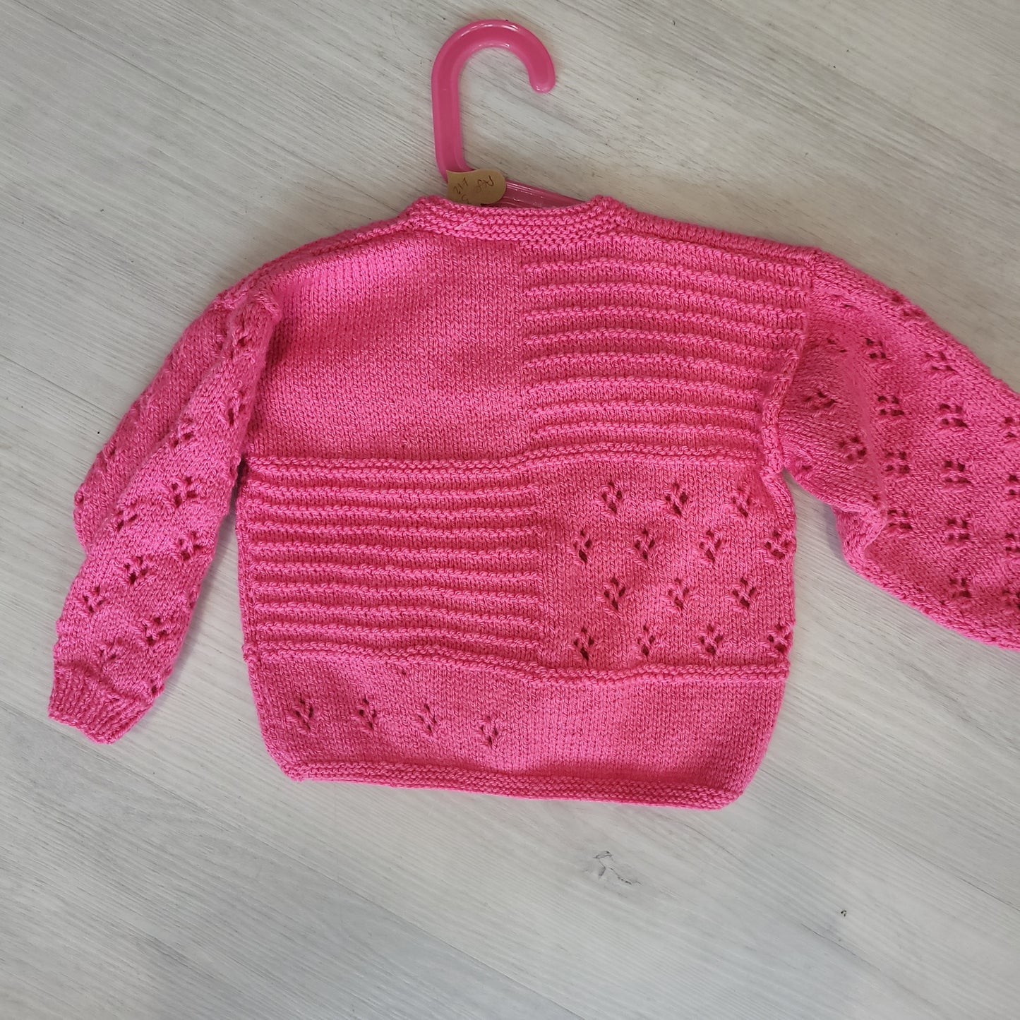 Handknitted girls cardigan pink age 3-4