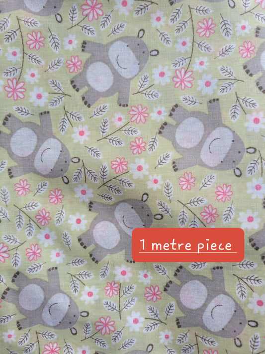Hippo light green daisy cotton material