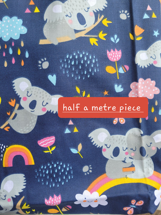 Koala rainbow navy print cotton fabric